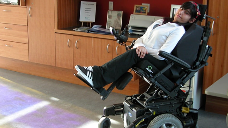 Image shows motorised wheelchair user